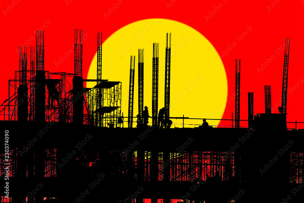 silhouette of construction at working time with sun and red background silhouette of construction at working time with sun and red background