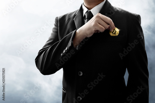 Businessman holding bitcoin