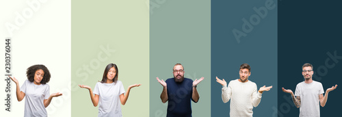 Bild auf Leinwand Collage of group of young people over colorful isolated background clueless and confused expression with arms and hands raised