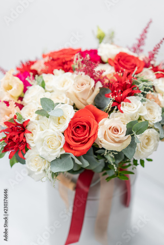 beautiful spring bouquet. Flowers arrangement with red and white colors.