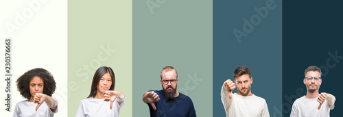 Collage of group of young people over colorful isolated background looking unhappy and angry showing rejection and negative with thumbs down gesture. Bad expression. photo