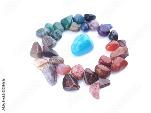 colored stones on a white background