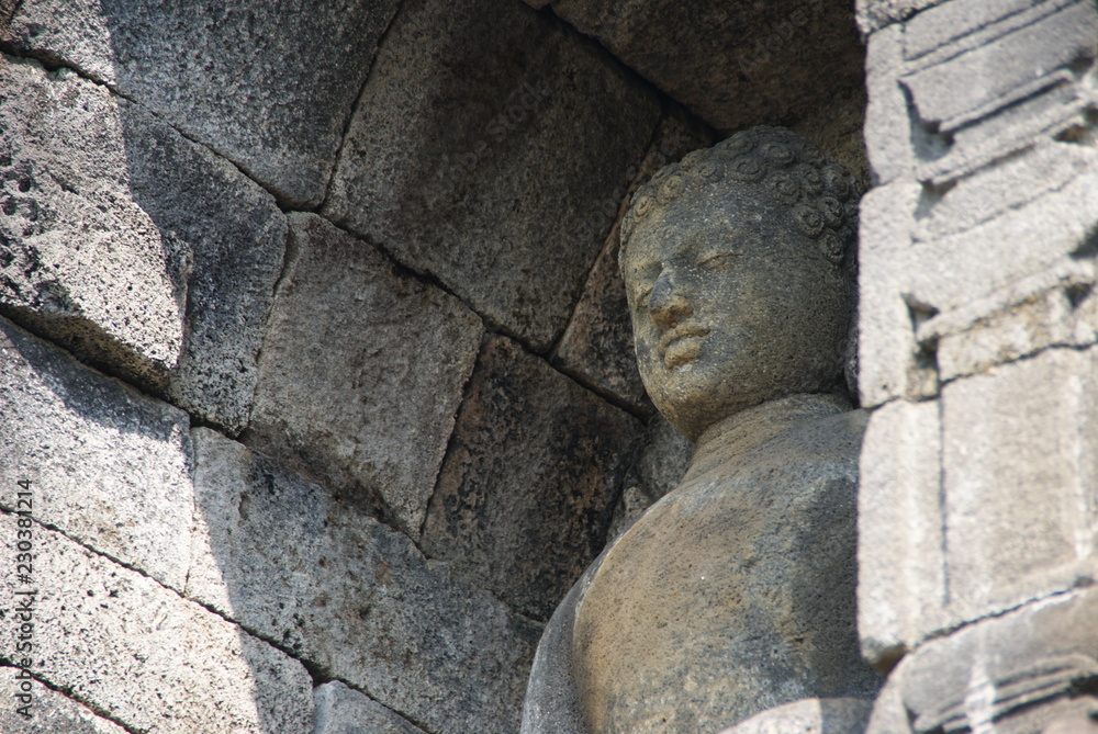 Image of sitting Buddha in Borobudur Temple, Jogjakarta, Indonesia Image of sitting Buddha in Borobudur Temple, Jogjakarta, Indonesia