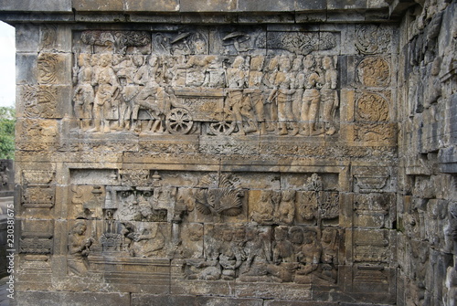 Relief or carvings on the wall of Borobudur Temple in Jogjakarta, Indonesia © craigansibin