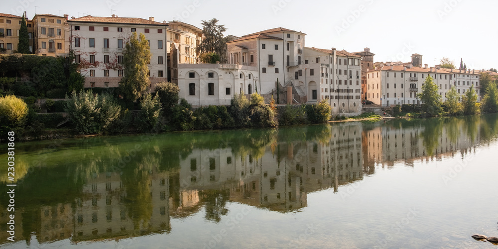 Bassano del Grappa (Italy, Veneto Region):houses over the Brenta river shores. Color image