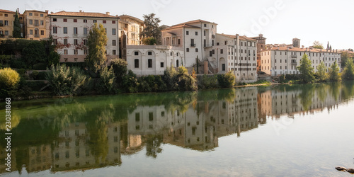 Bassano del Grappa  Italy  Veneto Region  houses over the Brenta river shores. Color image