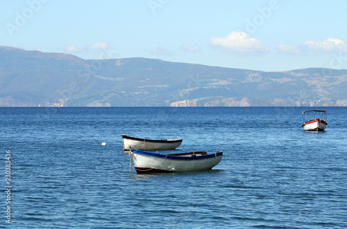 small fishing boats on Lake Ohrid landscape © goce risteski