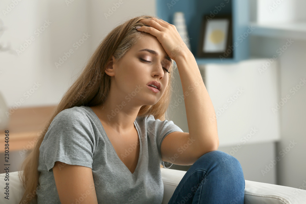 Lonely woman suffering from depression at home Lonely woman suffering from depression at home
