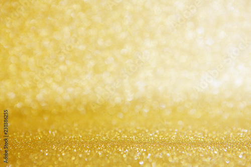 Golden and white abstract Christmas background with bokeh