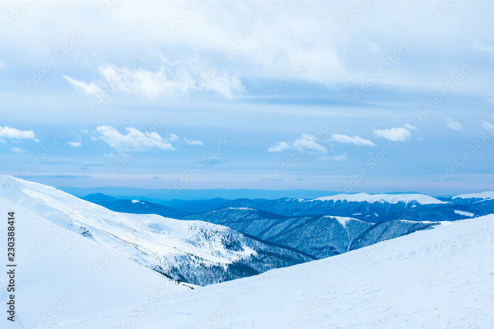 Ukrainian Carpathian mountains in winter. Dragobrat View from the top. Snow drops Winter fairy tale. Traveling