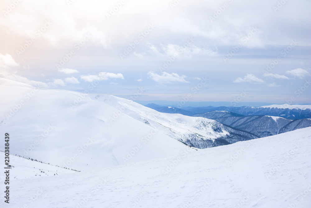 Ukrainian Carpathian mountains in winter. Dragobrat View from the top. Snow drops Winter fairy tale. Traveling Ukrainian Carpathian mountains in winter. Dragobrat View from the top. Snow drops Winter fairy tale. Traveling
