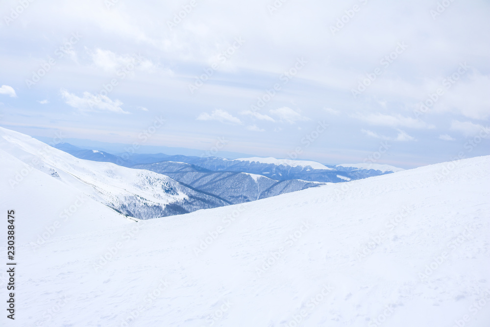 Ukrainian Carpathian mountains in winter. Dragobrat View from the top. Snow drops Winter fairy tale. Traveling Ukrainian Carpathian mountains in winter. Dragobrat View from the top. Snow drops Winter fairy tale. Traveling
