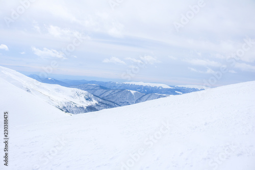 Ukrainian Carpathian mountains in winter. Dragobrat View from the top. Snow drops Winter fairy tale. Traveling © Yaroslav