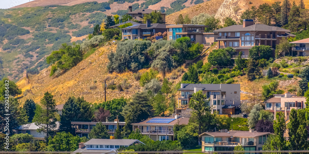 Salt Lake City homes on the slope of grassy hills