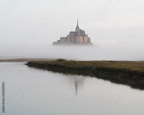 Mount Saint Michel, Normandy, France, during a foggy sunrise