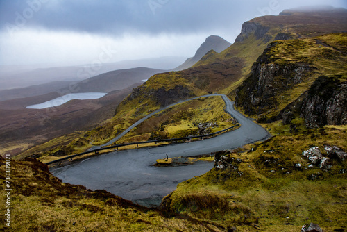 View of winding road on wet cloudy day, the Quiraing, Isle of Skye, Scotland photo