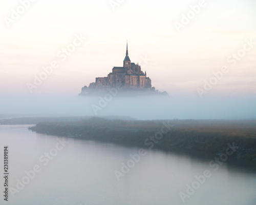 Mount Saint Michel  Normandy  France  during a foggy sunrise