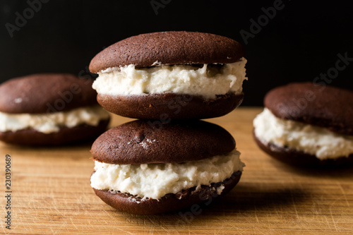 Homemade Chocolate Pies Filled with Vanilla Butter Cream. photo