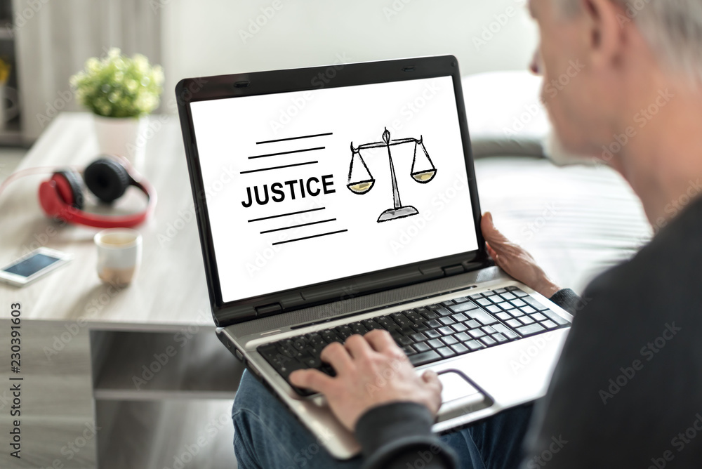 Justice concept on a laptop screen