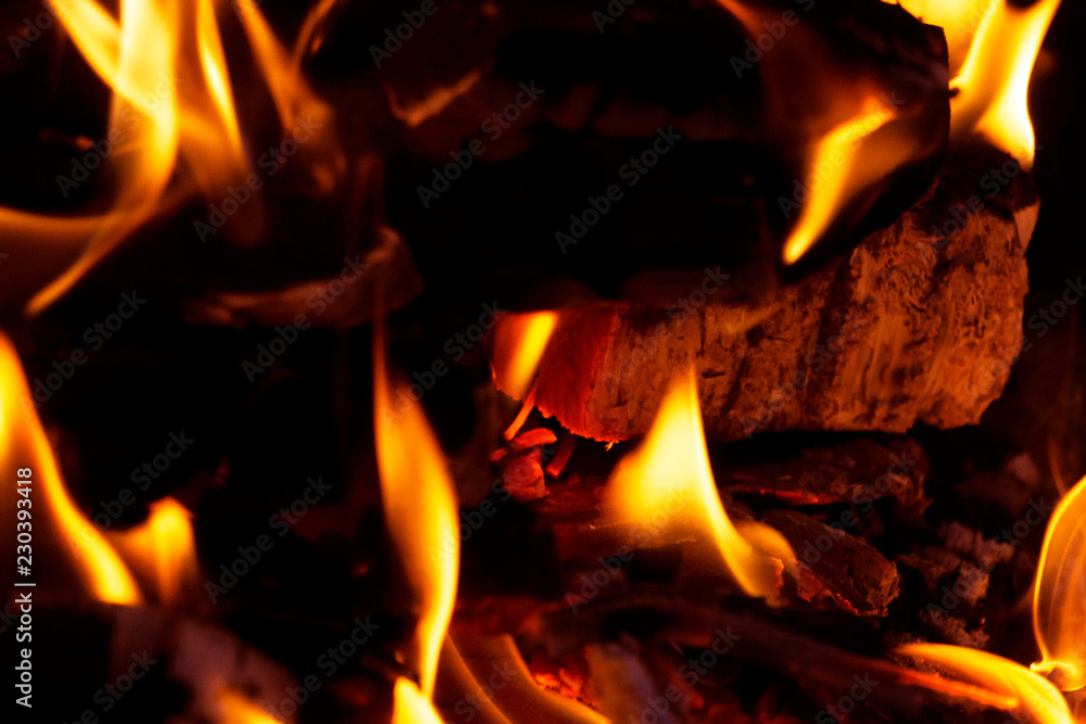 burning red wood, charcoal covered with fire burning red wood, charcoal covered with fire