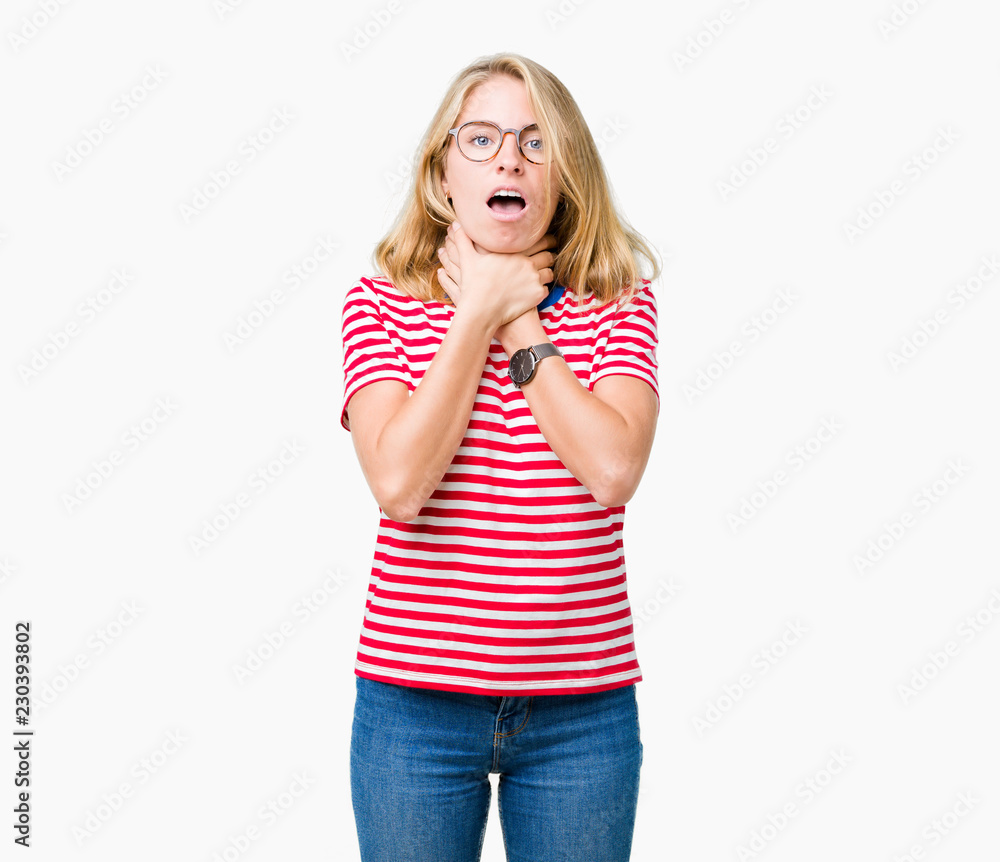 Beautiful young woman wearing glasses over isolated background shouting and suffocate because painful strangle. Health problem. Asphyxiate and suicide concept. Beautiful young woman wearing glasses over isolated background shouting and suffocate because painful strangle. Health problem. Asphyxiate and suicide concept.