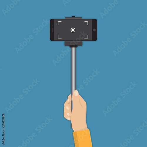Hand holding stick selfie with smartphone in a flat design
