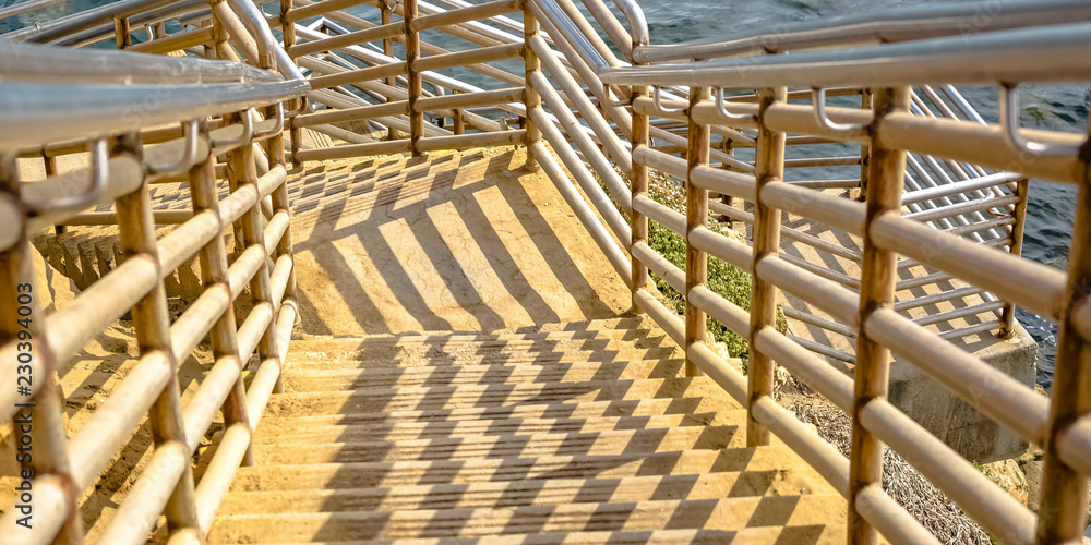 Stairs going down the calm ocean in Sunset Cliffs Stairs going down the calm ocean in Sunset Cliffs
