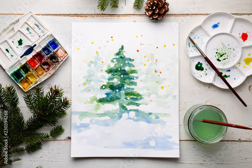 Painting a DIY Christmas card with watercolor
