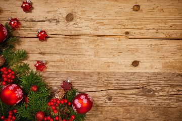 christmas gifts decoration on antique rustic wooden background; above view looking down with wood , top view with wood copy space