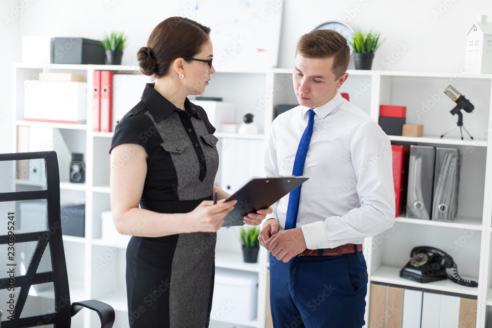 Obraz premium Young people working in the office with documents.