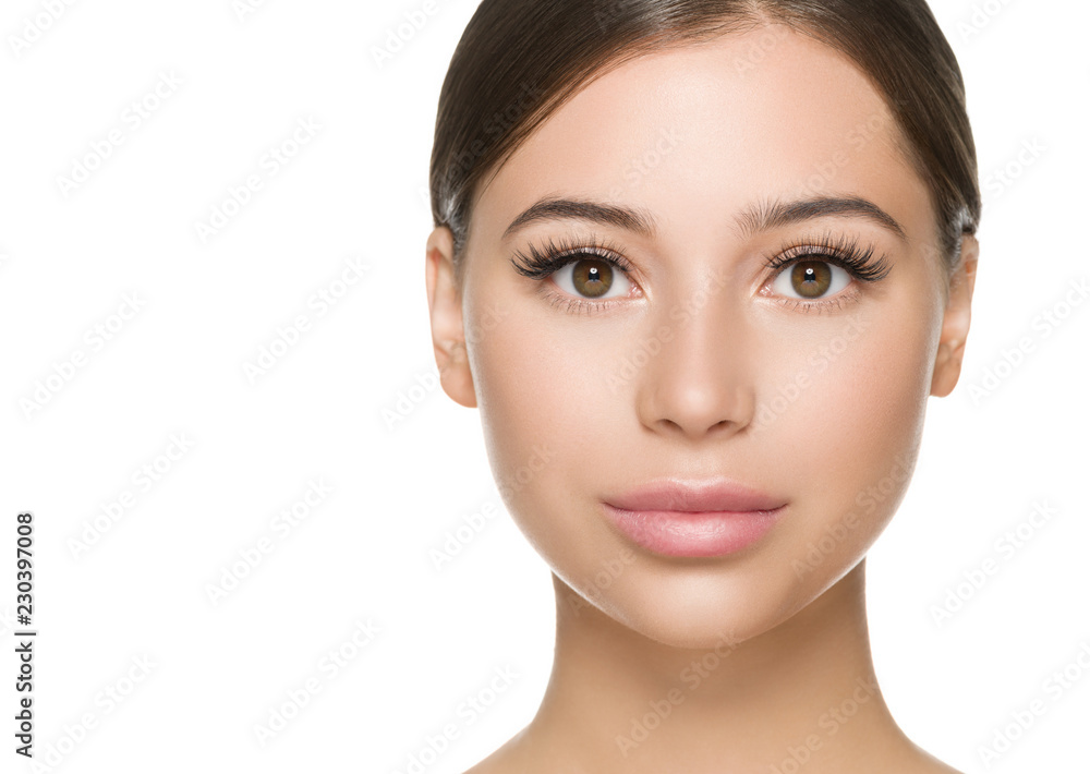 Beautiful woman face close up healthy skin and beauty lashes soft lips isolated on white Beautiful woman face close up healthy skin and beauty lashes soft lips isolated on white