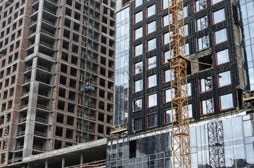 The process of building buildings. Construction site