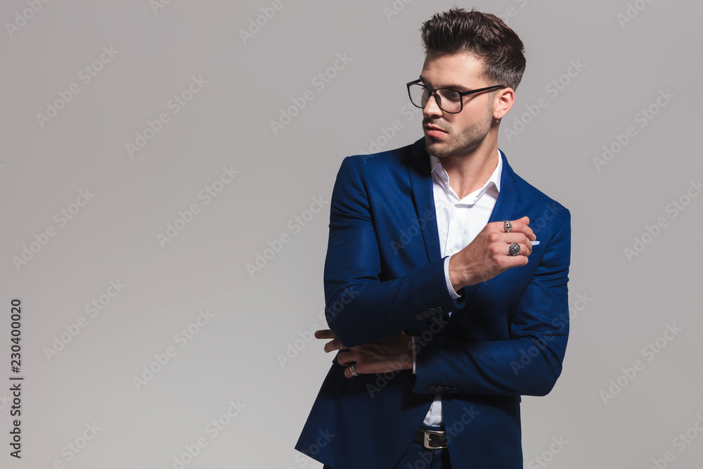 young elegant smart man thinks and looks to side Stock Photo Adobe Stock
