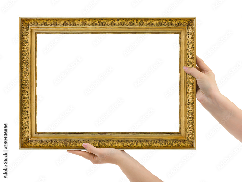Wooden picture frame in hands Wooden picture frame in hands