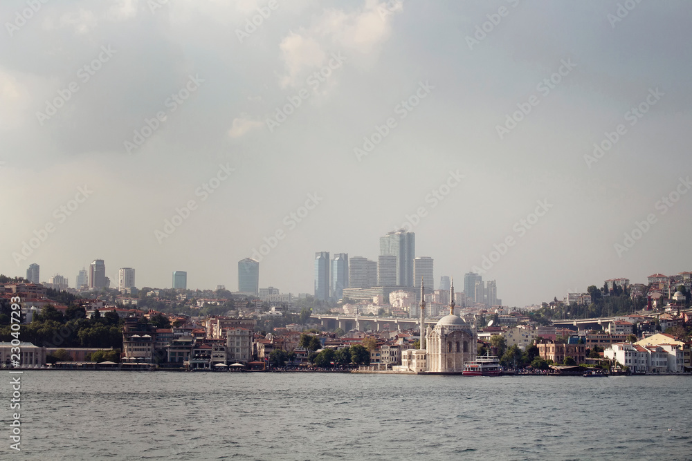 View of old, historical Ortakoy Mosque by Bosphorus and European side of Istanbul. View of old, historical Ortakoy Mosque by Bosphorus and European side of Istanbul.