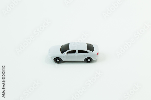 white car toy on white background image close up.