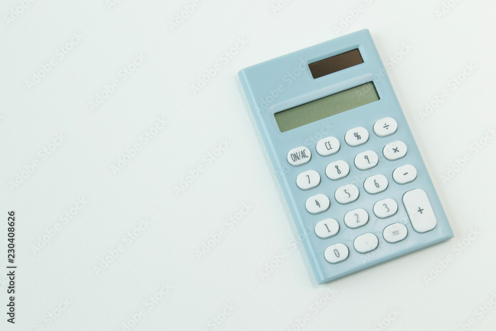 blue calculator white background image close up. blue calculator white background image close up.