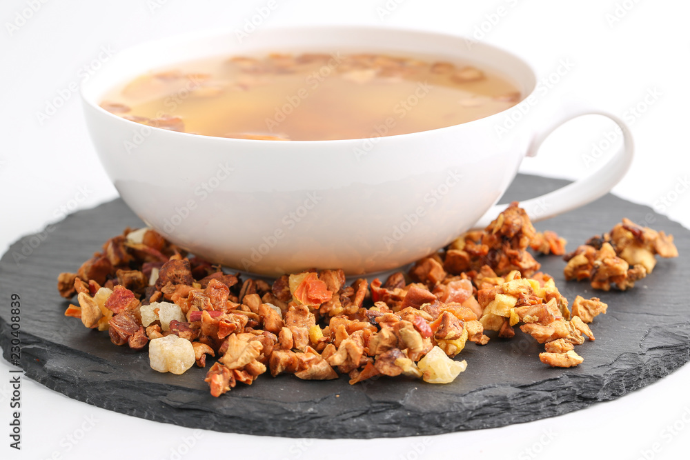 Still life, aromatic dry tea with fruits and petals Still life, aromatic dry tea with fruits and petals