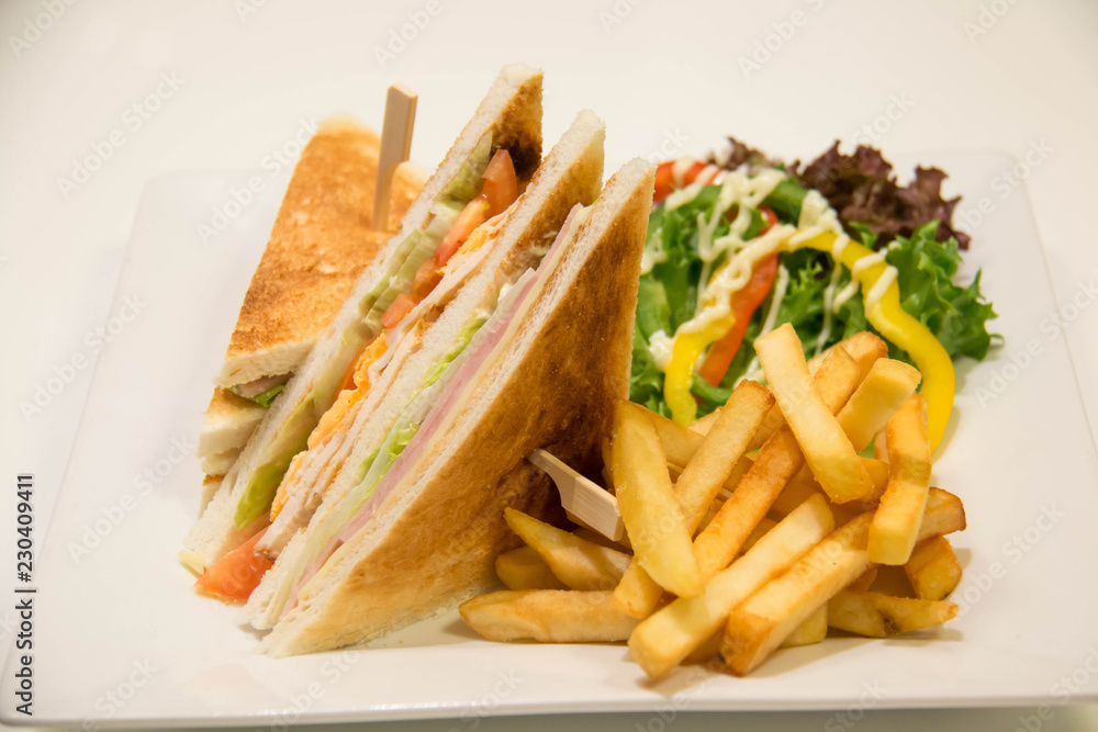 Chicken club sandwich with french fries Chicken club sandwich with french fries