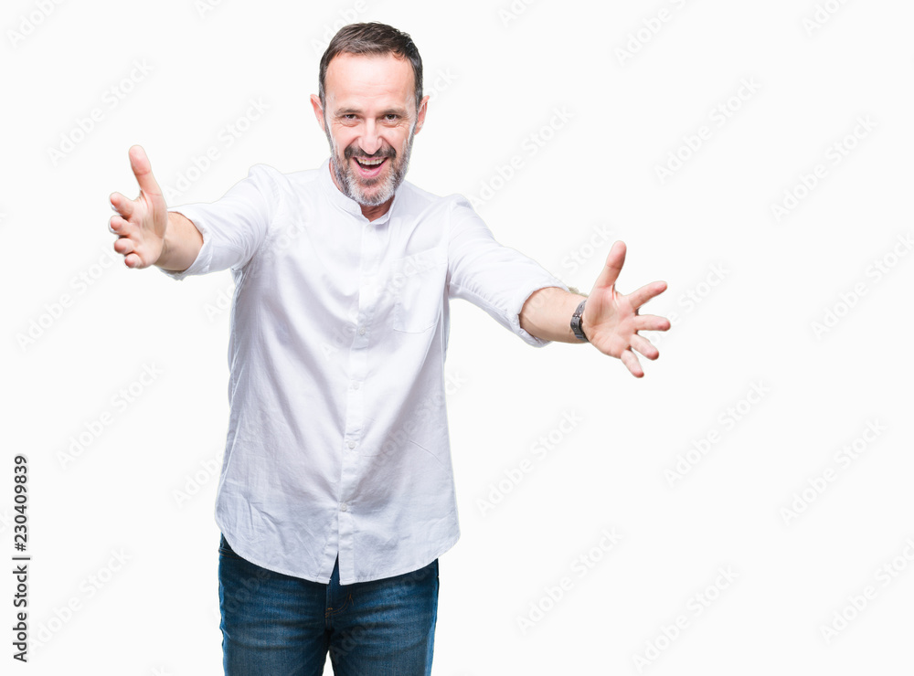 Middle age hoary senior man over isolated background looking at the camera smiling with open arms for hug. Cheerful expression embracing happiness. Middle age hoary senior man over isolated background looking at the camera smiling with open arms for hug. Cheerful expression embracing happiness.