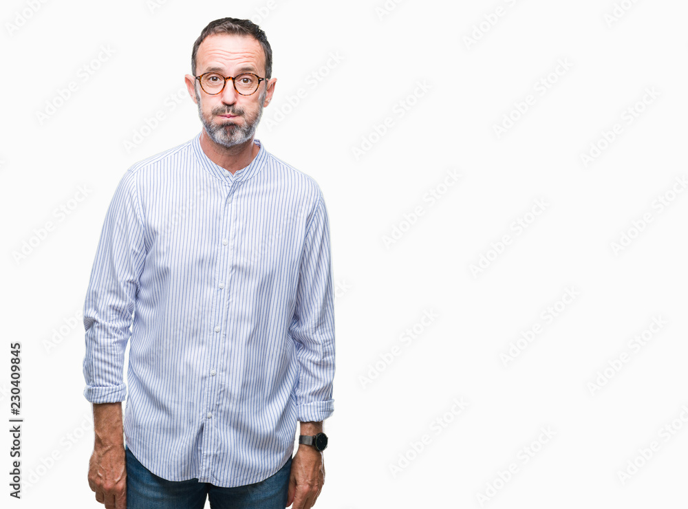 Middle age hoary senior man wearing glasses over isolated background puffing cheeks with funny face. Mouth inflated with air, crazy expression. Middle age hoary senior man wearing glasses over isolated background puffing cheeks with funny face. Mouth inflated with air, crazy expression.
