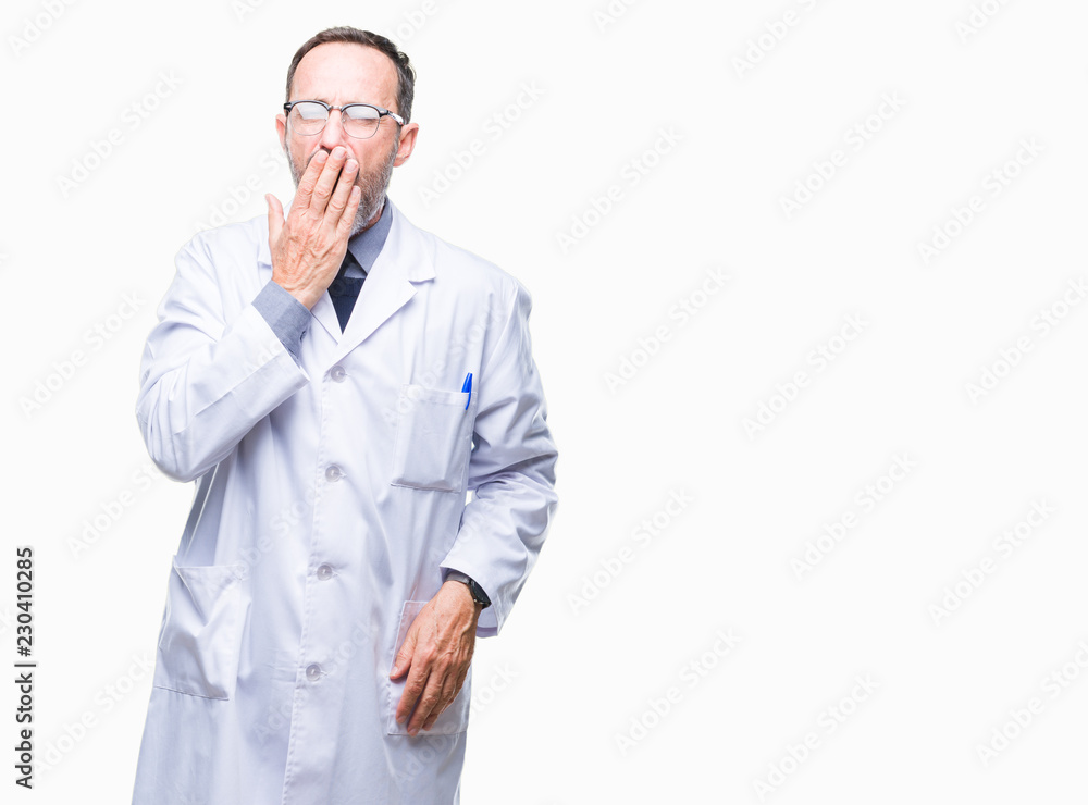 Middle age senior hoary professional man wearing white coat over isolated background bored yawning tired covering mouth with hand. Restless and sleepiness. Middle age senior hoary professional man wearing white coat over isolated background bored yawning tired covering mouth with hand. Restless and sleepiness.