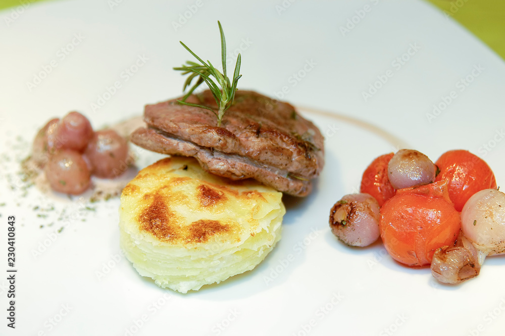 Slices Of Beef With Potatoes And Onions