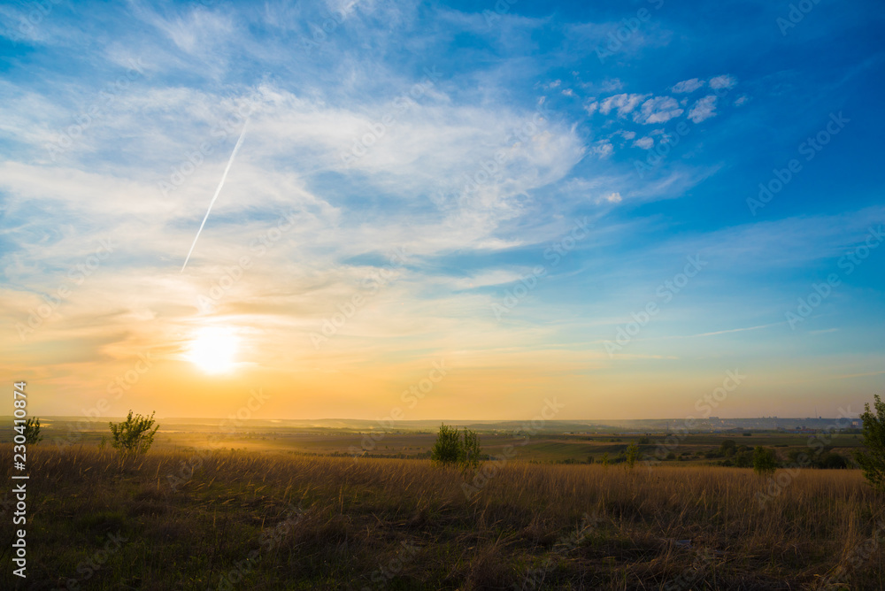 very beautiful summer sunset with bright colors of the sky