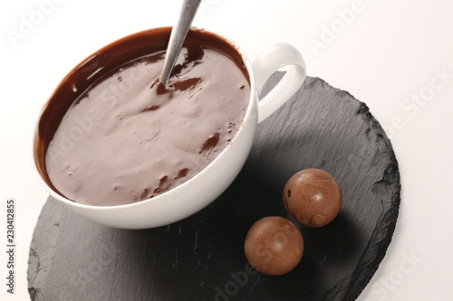 close up of dark hot chocolate cup on