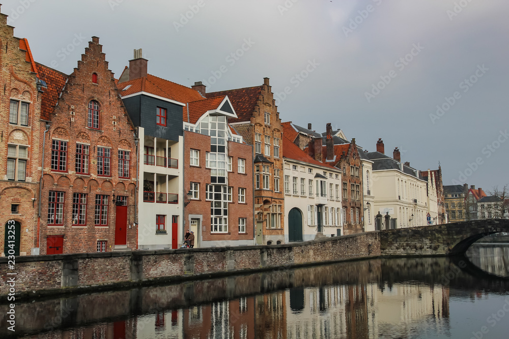 view of the old houses on the embankment of the river in the city of Ghent in Belgium