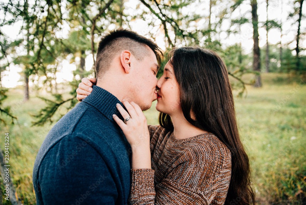 photo shoot of a beautiful brunette and her boyfriend in nature photo shoot of a beautiful brunette and her boyfriend in nature