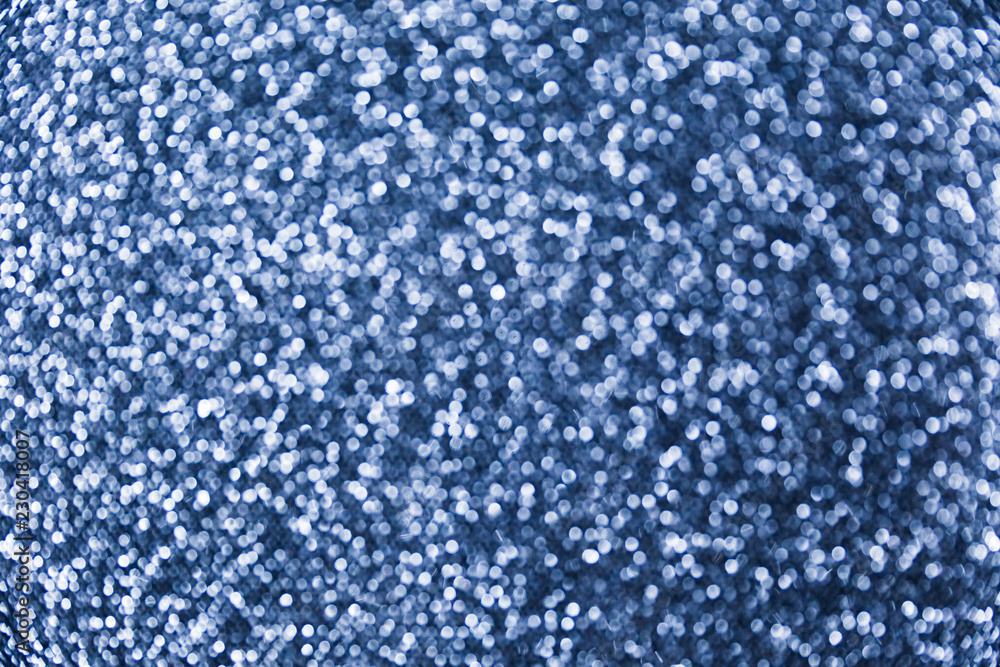 Obraz premium Glamour blue sparkling background. Blurred glitter background