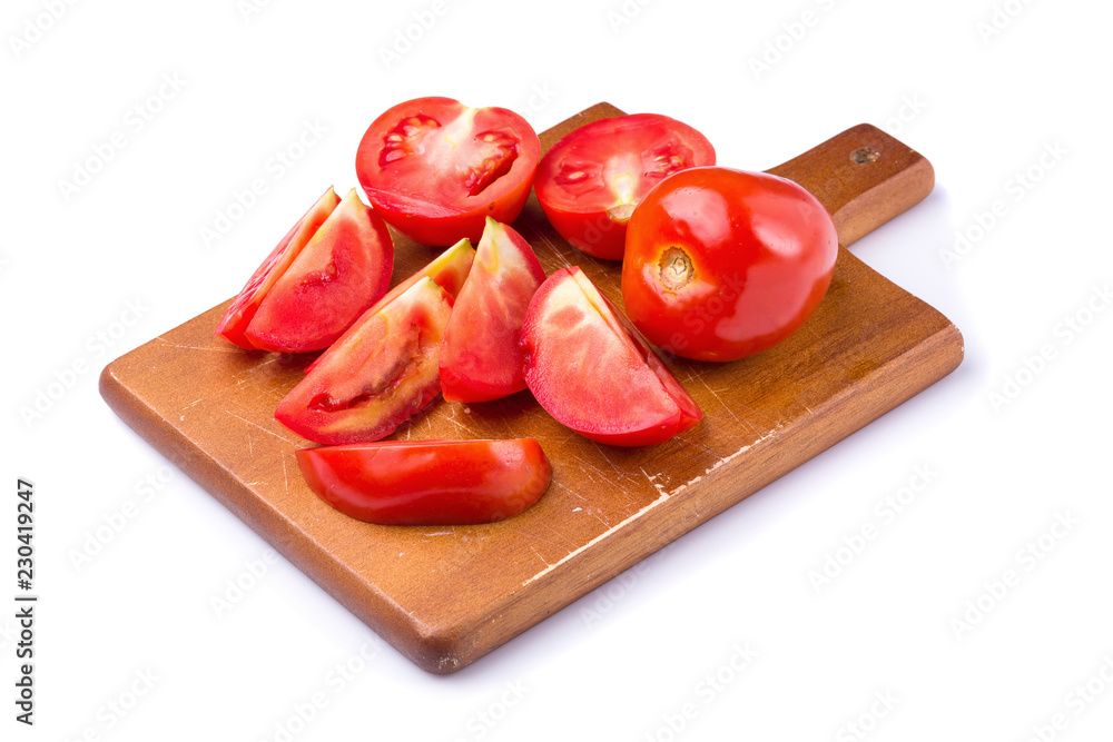Slice of tomato isolated on a white background Slice of tomato isolated on a white background