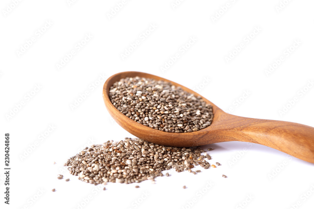 Close up a Chia seeds in wooden spoon , superfood and rich of nutrient an antioxidant Close up a Chia seeds in wooden spoon , superfood and rich of nutrient an antioxidant